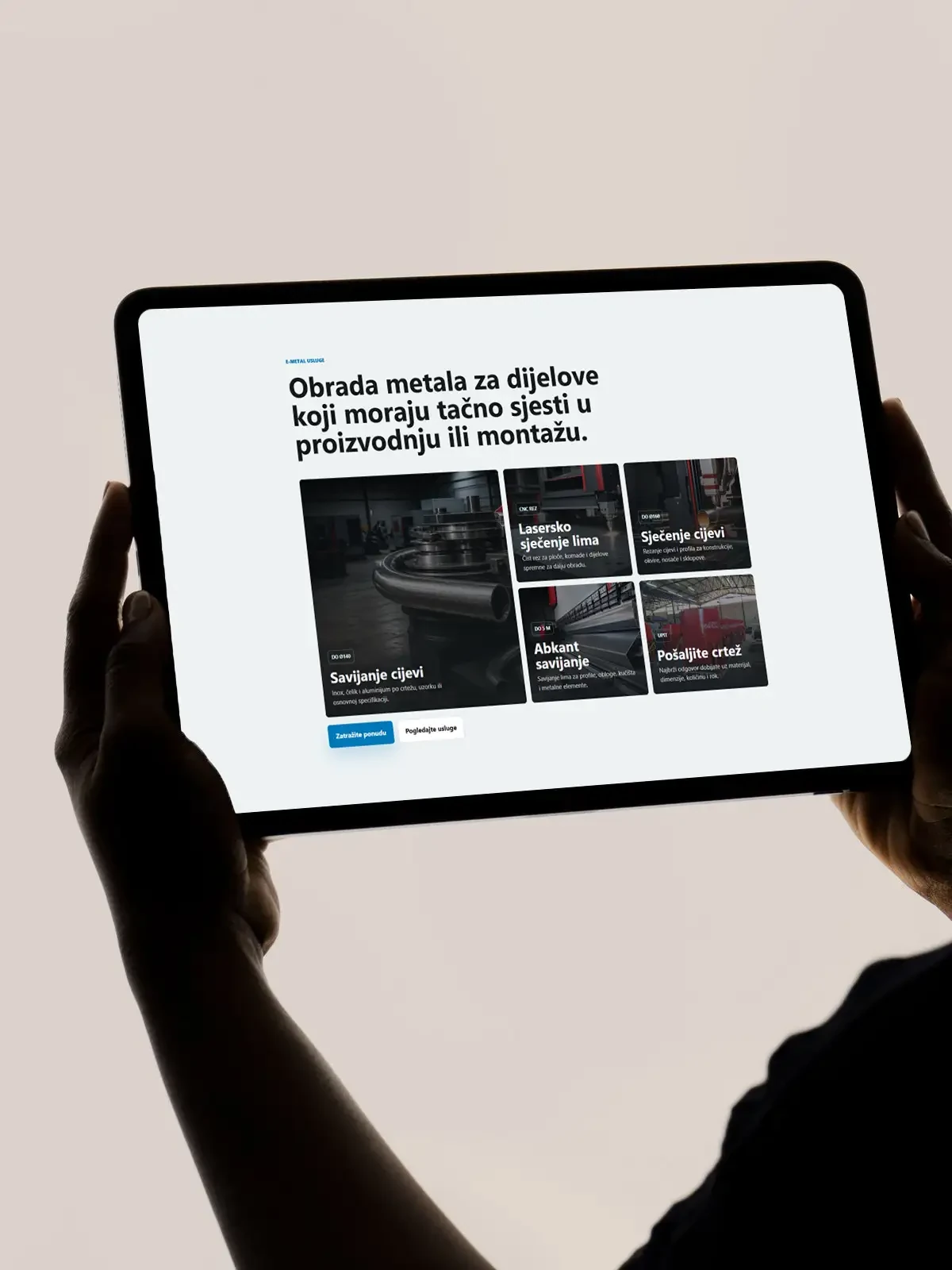 E-Metal website displayed on a tablet